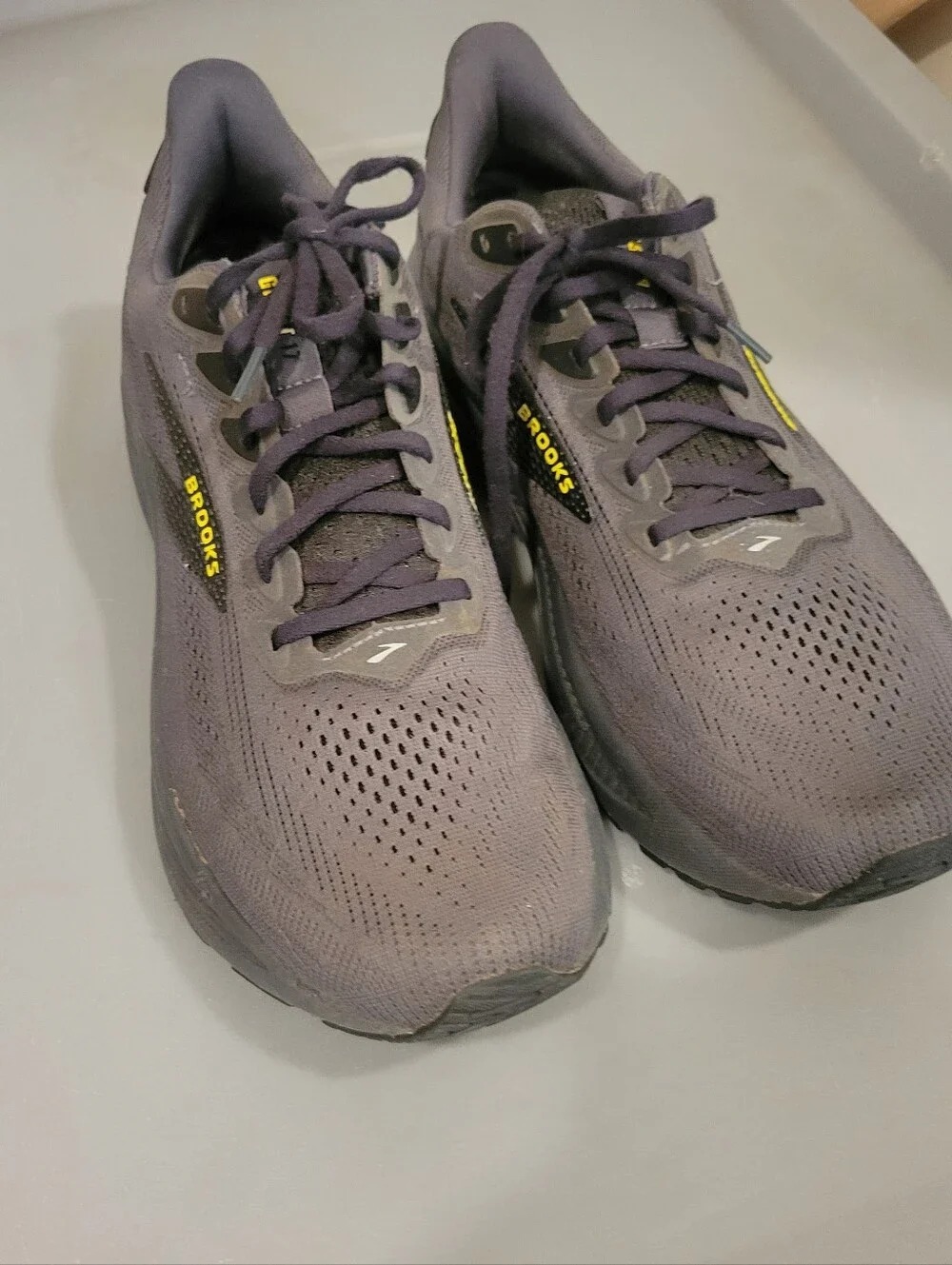 Brooks Ghost 17 running shoes feature a dark ebony and black colorway. Mens 13